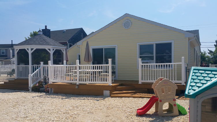 Bayville, NJ house before raising, rear view