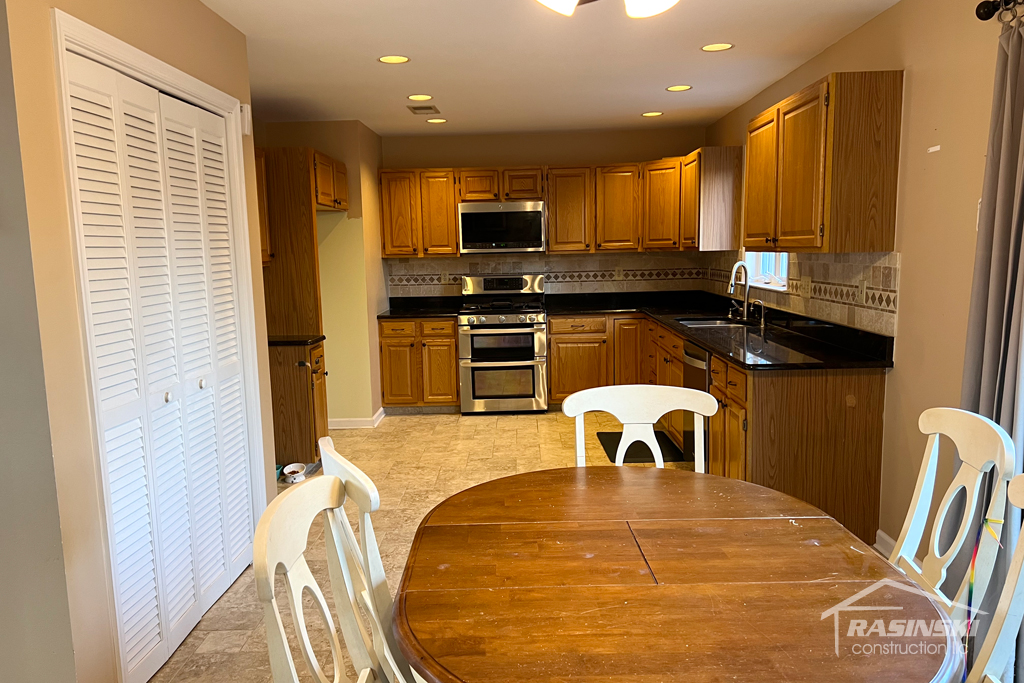 Mercer County Kitchen with Dark Wood Cabinetry Before Remodel Photo Angle 3