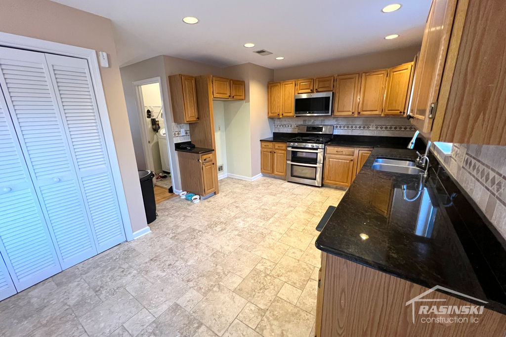 Mercer County Kitchen with Dark Wood Cabinetry Before Remodel Photo Angle 2