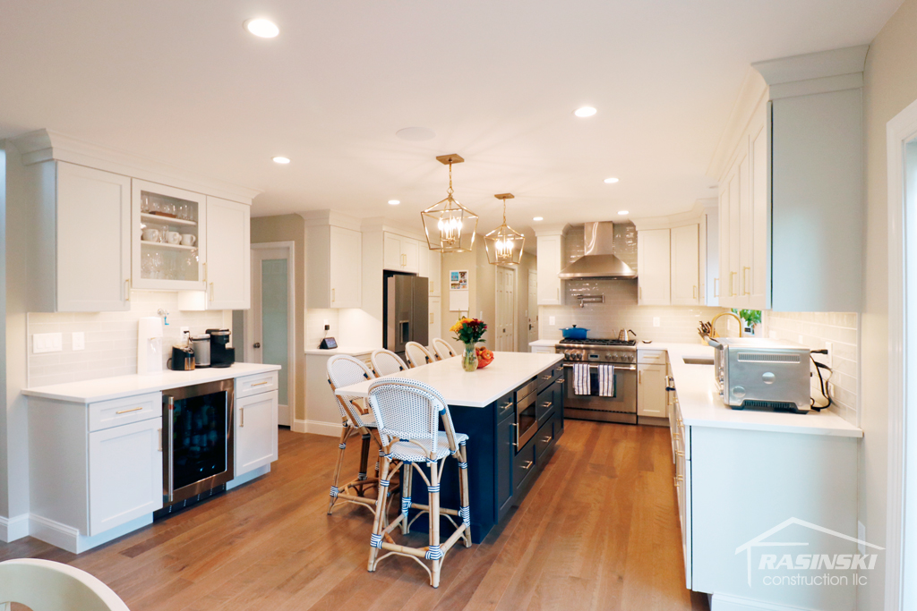 Newly Remodeled Kitchen with White Cabinets, Stainless Steel Appliances, and Pantry in Mercer County NJ by Rasinski Construction